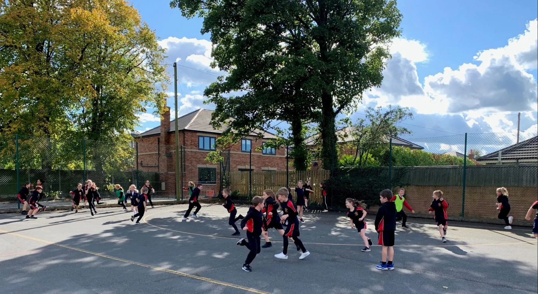 KIDS PLAYING IN A PLAYGROUND 