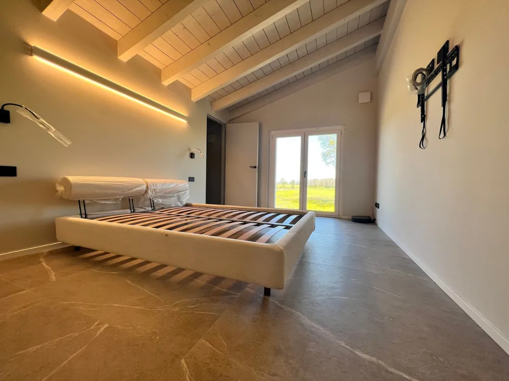 Trasformazione completa da struttura grezza a casa contemporanea Lodi